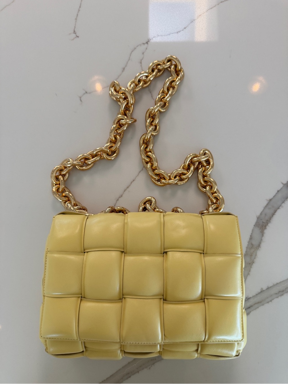 Bottega Veneta Intrecciato Cassette Bag
Butter Yellow Lambskin Leather